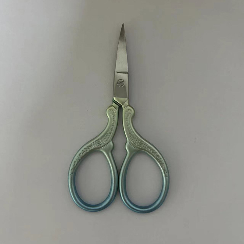 Tijeras Xiaofeng de acero inoxidable Tijeras bordadas Tijeras en relieve Bolsitas de té Tijeras de hilo de pescado Tijeras de maquillaje para cejas