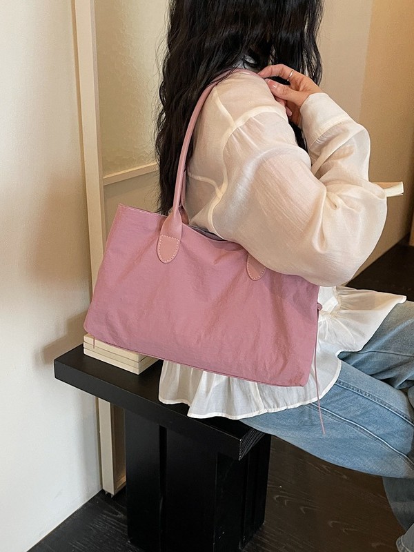 2026 nuevo paquete de moda de tela de alta capacidad, bolso de hombro de alta calidad, bolso de bolsillo pequeño y multifuncional.