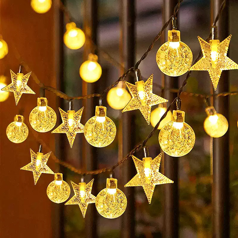 New solar-powered LED ambient light, outdoor light, star-shaped courtyard light string light, waterproof balcony garden light with hanging tree decorations.