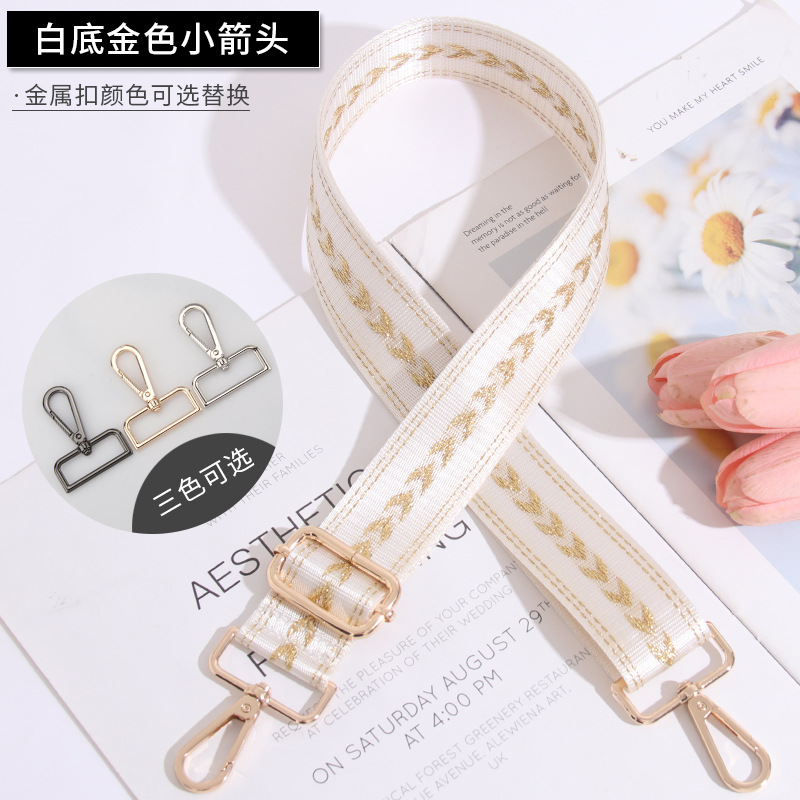 Small golden arrow on white background
