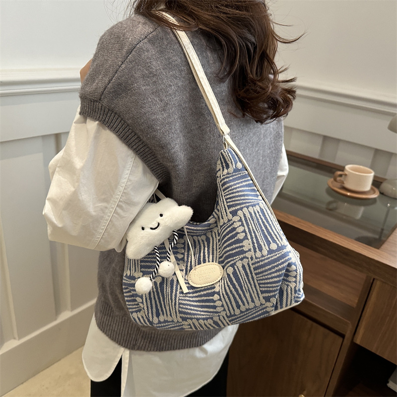 Bolso de lona para mujeres 2024 nuevo otoño bolso universitario de doble propósito mochila de hombro de viaje universal mochila de hombro