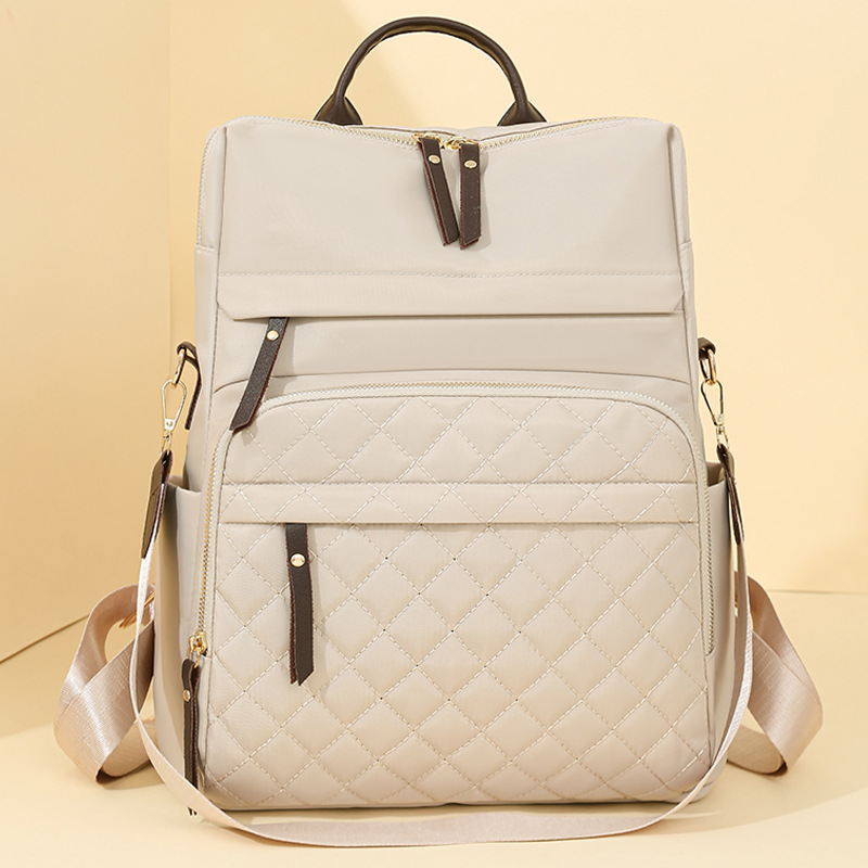 Mochila de nailon para mujer 2025 nueva mochila casual para mujer moda Lingge casual mochila ligera de gran capacidad marea