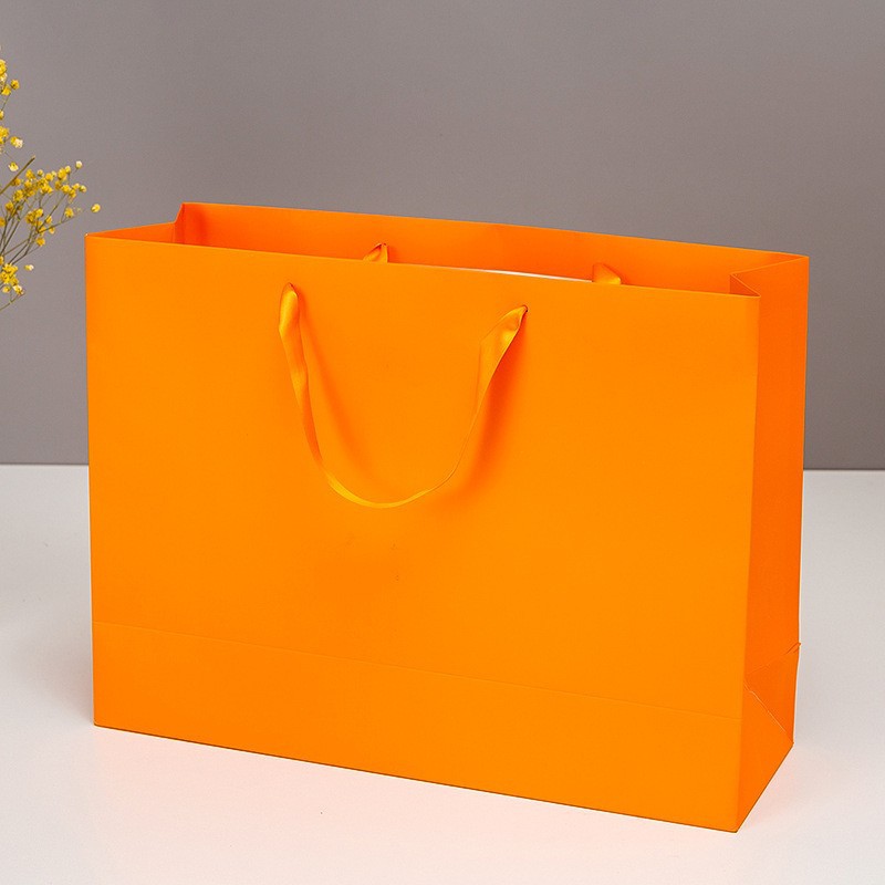 Bolsa de papel de regalo espesa, ropa de compra, cosméticos, bolsas de mano de alta calidad, bolsas de papel especiales LOGO personalizado