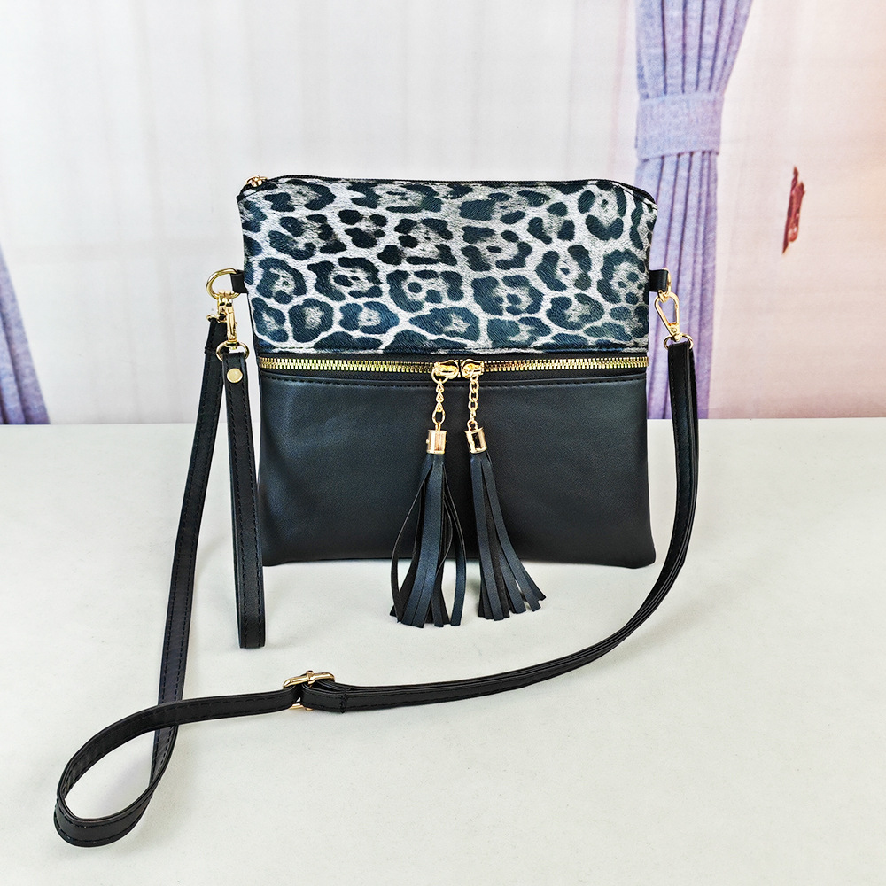 Bolso de leopardo de mujer bolso de moda europeo y americano nuevo bolso inclinado de hombro único bolso de color de choque ultrafino bolso de mano con borlas