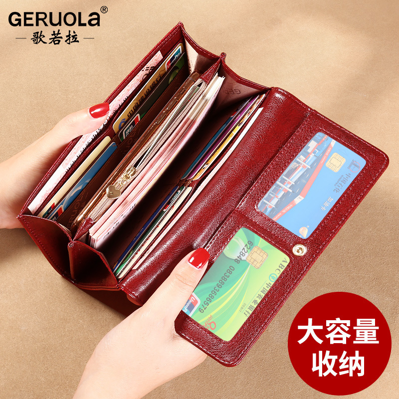 Suministro directo de fábrica, billetera de mano, cuero largo para mujer, posición de múltiples tarjetas, bolso de tarjeta de teléfono móvil simple y versátil, billetera integrada para mujer