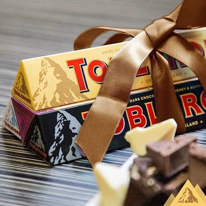 Импортированный треугольный шоколад Toblerone (Toblerone) 100 г — assorted вкусы: молочный, тёмный, белый, солёный