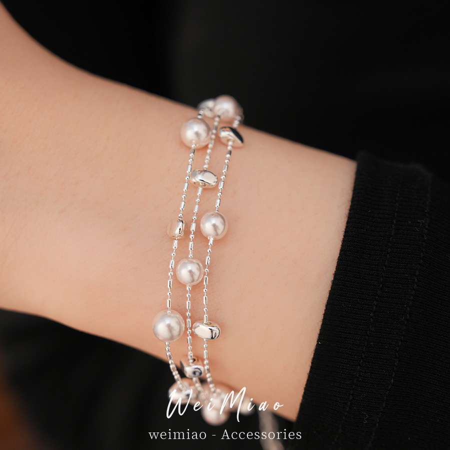 Pulseras de perlas redondas multicapa ligeras de lujo nicho pulseras de alta calidad temperamento de moda universal joyas al por mayor para mujeres image 3