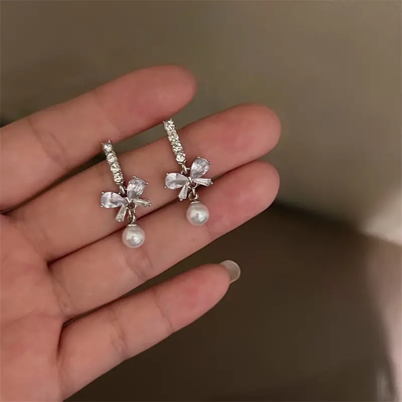 Bow pearl pendant stud earrings