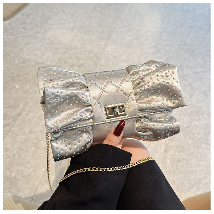 Paquete de cena de damas transfronterizas, paquete de fiesta de lujo ligero de diamante, paquete de cena de mano de arco de arco de oro de alto nivel