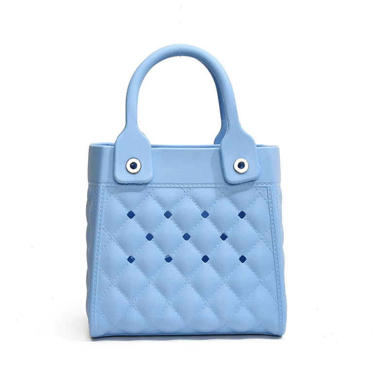 Bolso Tote de moda coreana 2025 verano nuevo estilo bolso femenino agujero hueco bolso de mano moda ringge bolso de playa marea