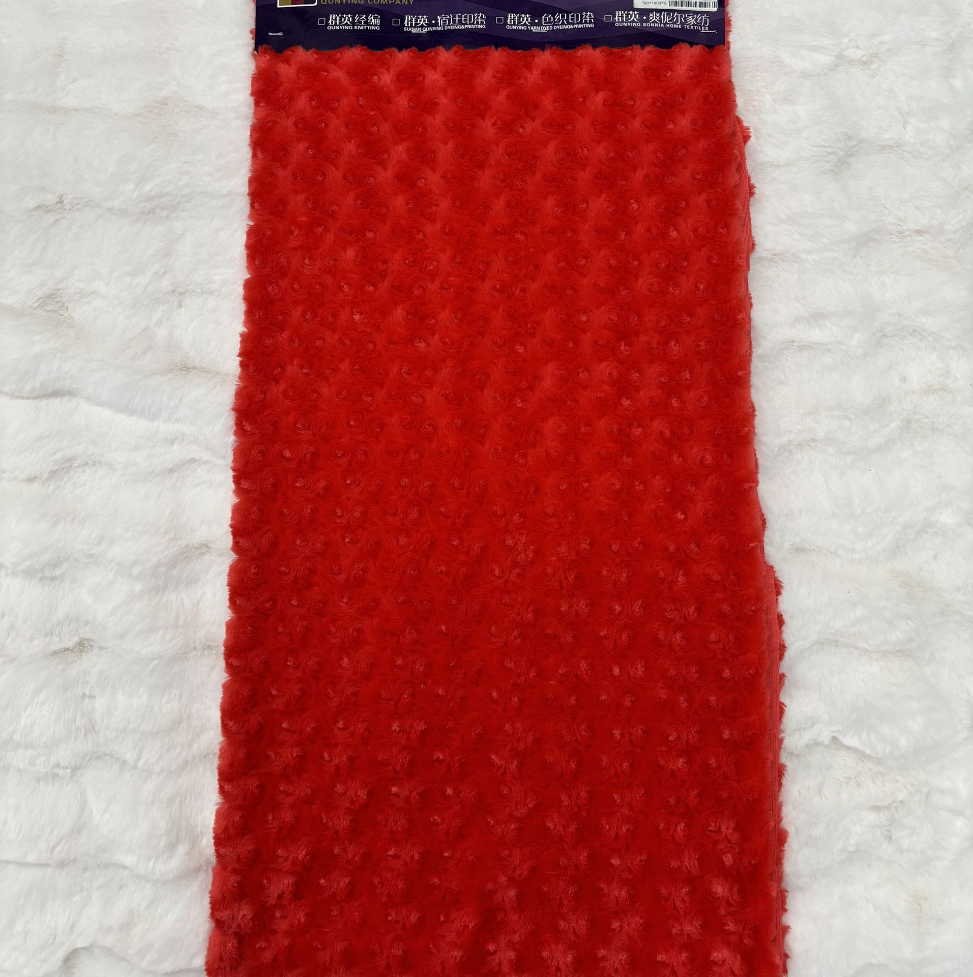 面料工厂直销新设计橘红色磨圈南韩绒面料Pv绒毛绒玩具空调毯面料
