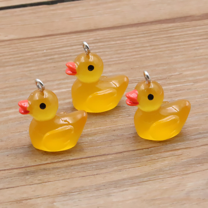 7 colores 19*20mm accesorios de resina de bricolaje patito colgante luminoso encanto equipaje collar pulsera colgante