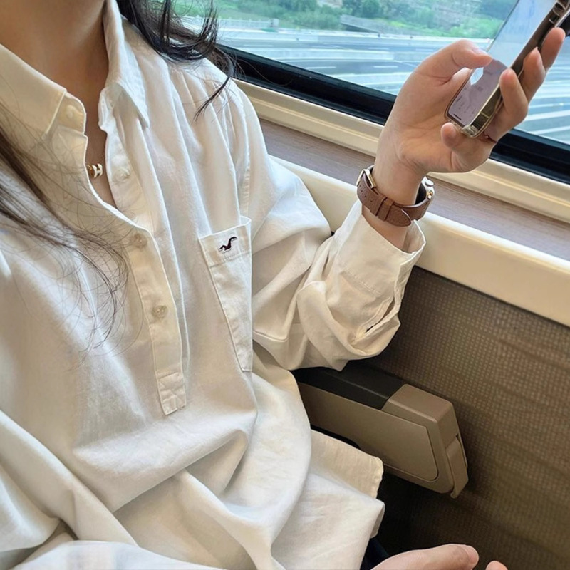 女性のための純綿白ポロシャツ、春先の新しいスタイル、フランスのハイエンドニッチ長袖トップデザイン|undefined