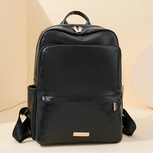 工厂定制约PU书包女2025新款潮流大容量软皮背包简约纯色复古女士