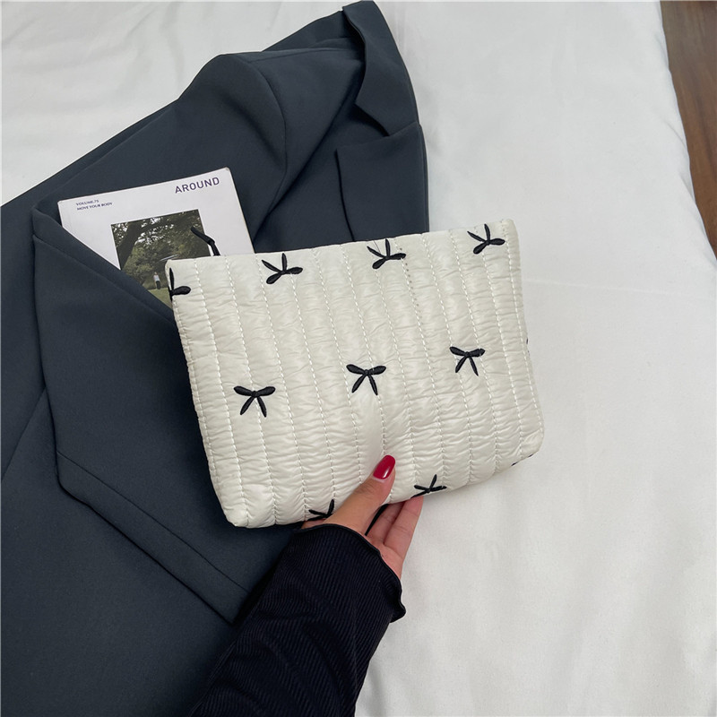 2025 invierno nueva moda portátil bolso de mano mecha de moda impresión mariposa de maquillaje de gran capacidad bolso de mano