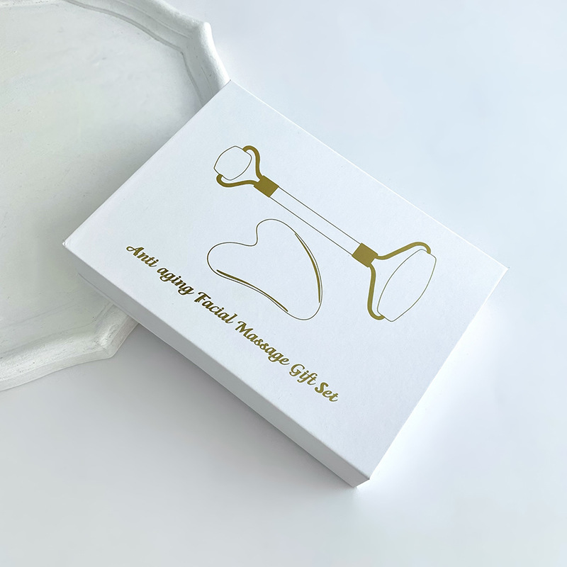 Jade rodillo de masaje facial traje de doble cabeza de metal manual belleza facial relajante dispositivo cara empujando aparato al por mayor