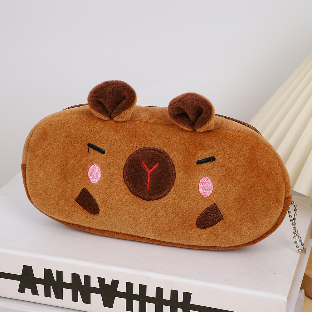 Bolso de lápices de felpa Kapibala de estilo explosivo Bolso de papelería para niños de carpincho de dibujos animados de gran capacidad Bolso de almacenamiento de suministros escolares