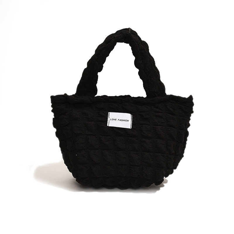 Versión coreana del nuevo bolso de hombro de color caramelo de corazón de niña pliegue de burbuja de nube simple bolso de gran capacidad mujer