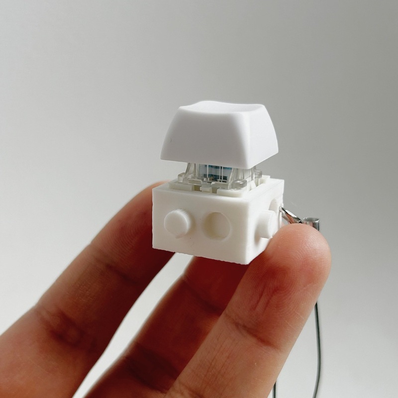 国境を越えたスプライス可能なビルディングブロックボタン減圧おもちゃキーホルダーペンダント指先プレス発光おもちゃ指先ボタン|undefined
