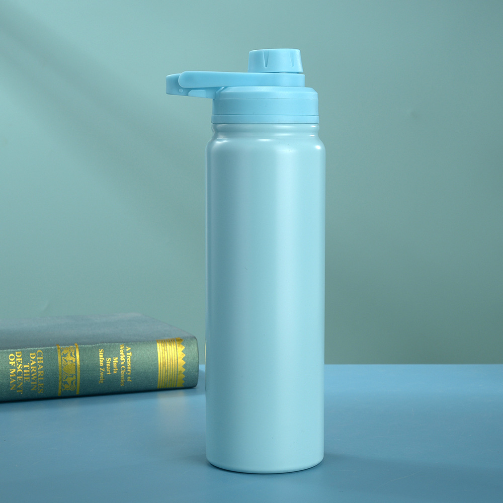 Nueva doble capa de acero inoxidable botella espacial cubierta de boca inclinada portátil al aire libre botella deportiva vacío taza de aislamiento de calor