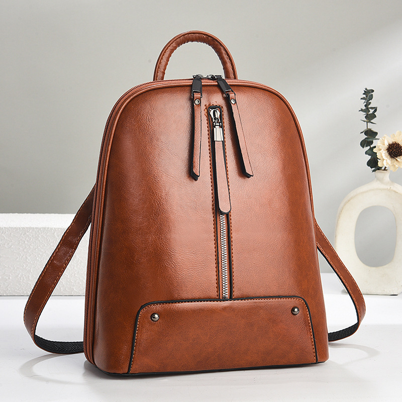 Mochila para mujeres 2025 nueva moda retro mochila de cuero de aceite de gran capacidad, mochila de damas ligera, bolsa de viaje universal