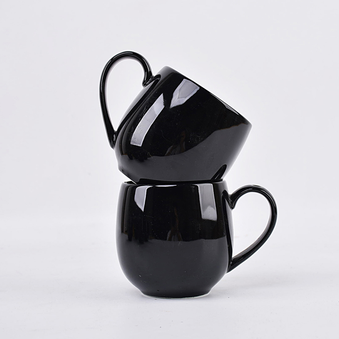 black A set of four six ceramic mugs for hot beverages