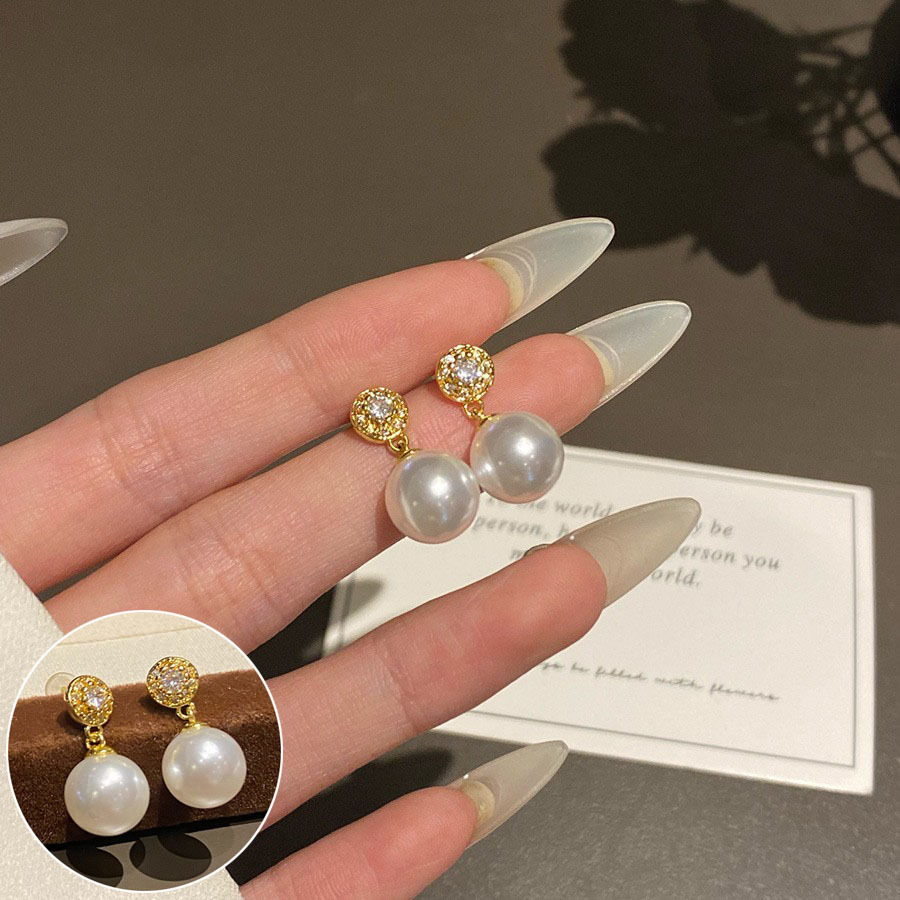 Estilo coreano S925 Plata pequeños pendientes de perlas simples de las mujeres pendientes de temperamento de moda retro pendientes ins pendientes artísticos