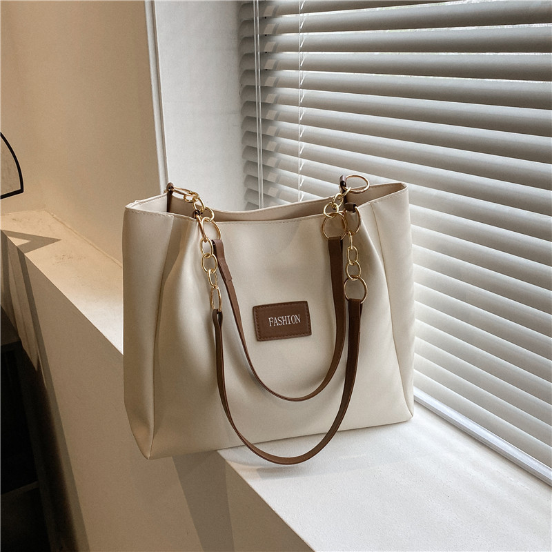 Bolsa de invierno de gran capacidad para mujeres 2024 nueva bolsa de hombro universal de moda alta sensación extranjera bolsa de viaje