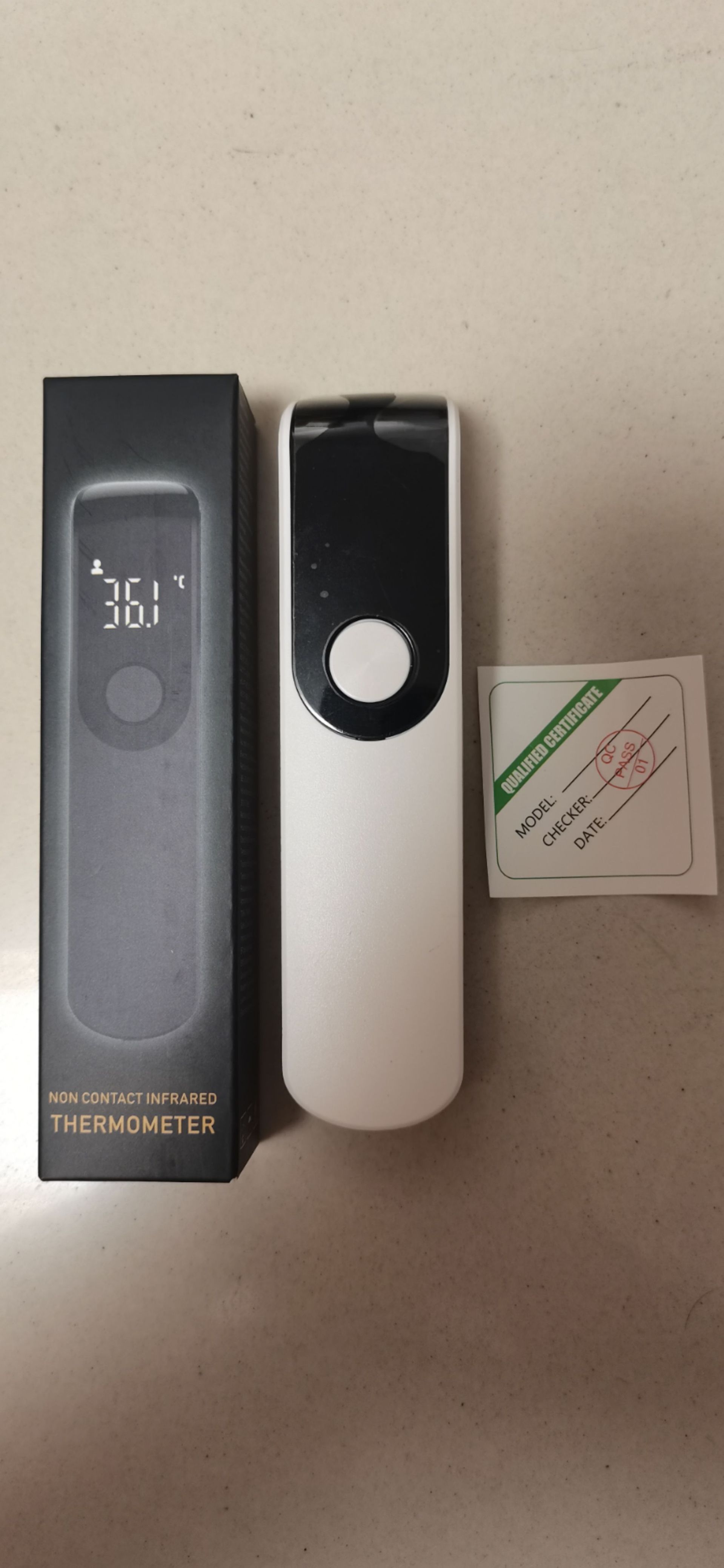 Termómetro de frente mini original de fábrica, termómetro electrónico infrarrojo sin contacto de mano, termómetro para bebés en chino/inglés/japonés