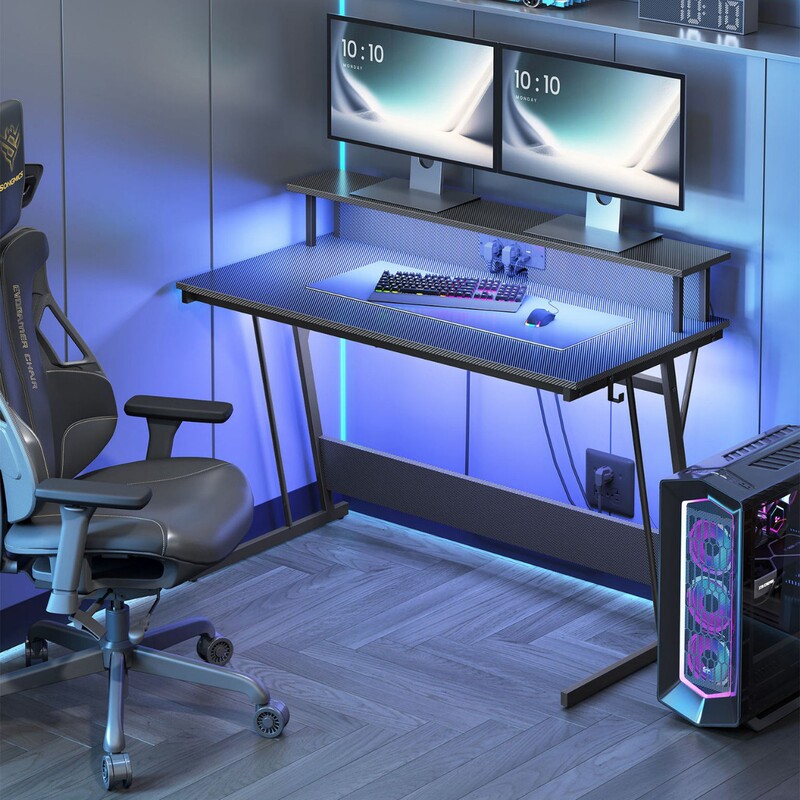 Modern Hot-Selling Model Computer Desk with Fiber Optic Surface, Built-In Power Strip, and Hooks