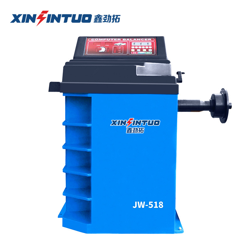 Desmontadora de neumáticos totalmente automática Jintuo, máquina desmontadora de neumáticos potente a prueba de explosiones con brazos auxiliares duales y sistema neumático.