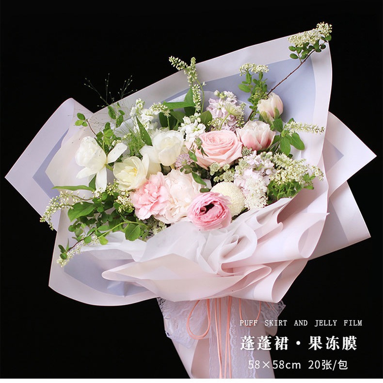 Lizhi Ran falda tutú película de gelatina borde capa papel de embalaje de flores ramo papel de embalaje al por mayor