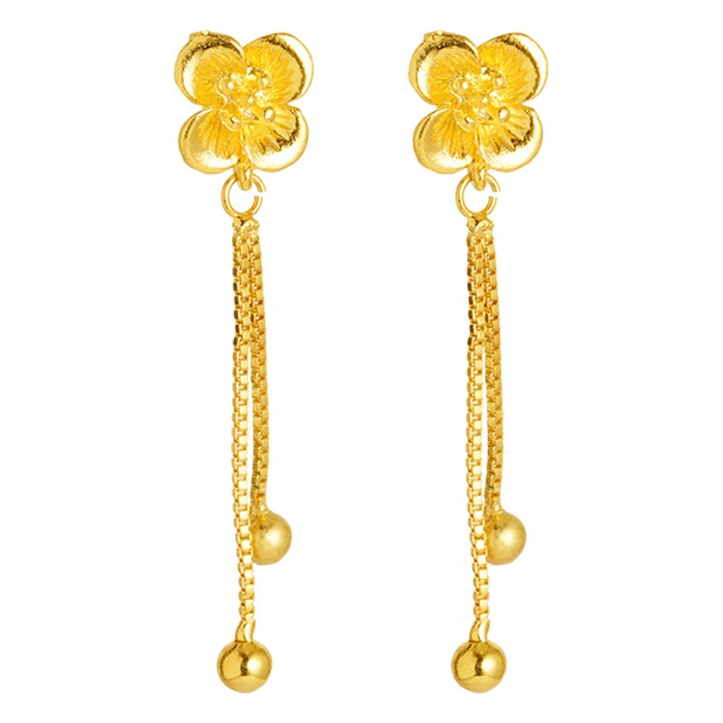 INS Flor de cuatro hojas línea de oreja de mujer Vietnam arena oro borla larga luz pendientes de lujo moda todo partido Internet estilo de la celebridad al por mayor