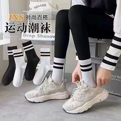靴下女性の春と夏のミッドカーフソックスストライプ平行棒カレッジトレンドソックスイン黒と白のパイルソックス綿の靴下卸売靴下
