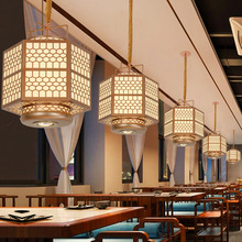 新中式餐厅火锅店灯笼吊灯饭店酒楼包厢铁艺鸟笼创意中国风带射灯