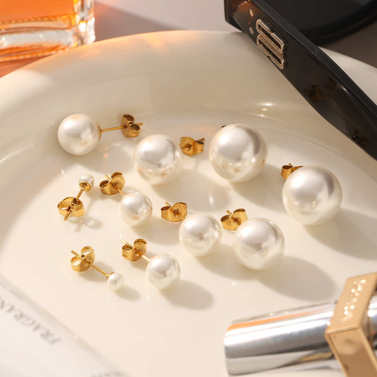 fashionable earrings from pearl stainless steel