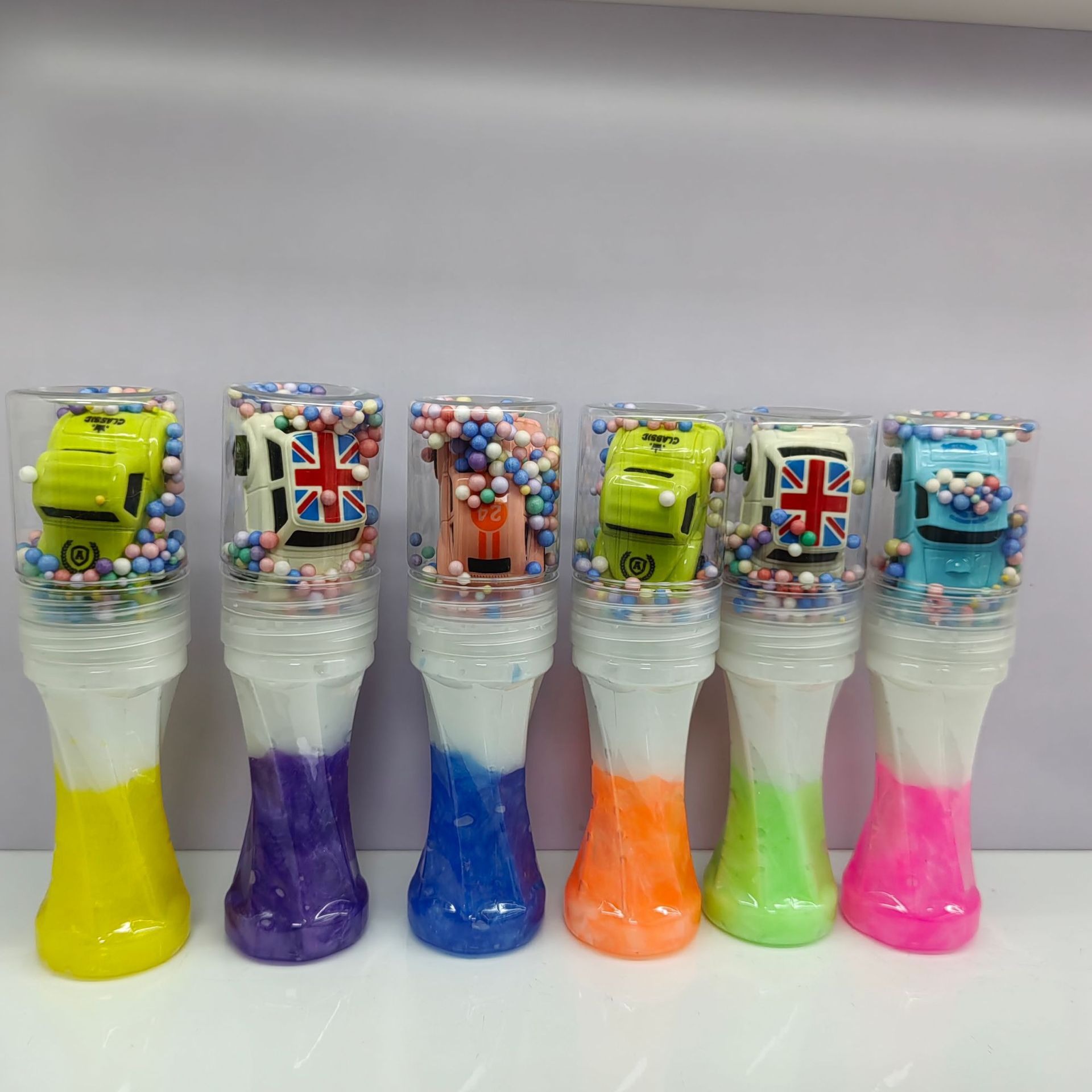 Transfronterizos de suministro directo de bicolor perla brillante cristal barro accesorios de goma espumante adorable de alto valor de la cara pequeña botella de cintura grande Slay