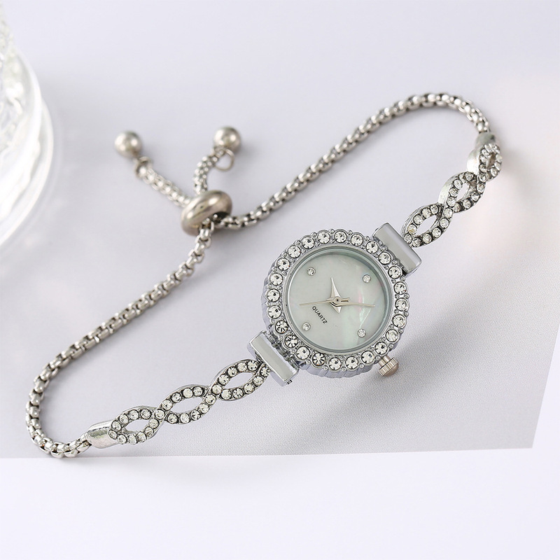 Winding pattern fashion small diamond round women's commuter versatile flexible retractable watch chain Women's quartz watch Winding pattern fashion small diamond round women's commuter versatile flexible retractable watch chain Women's quartz watch