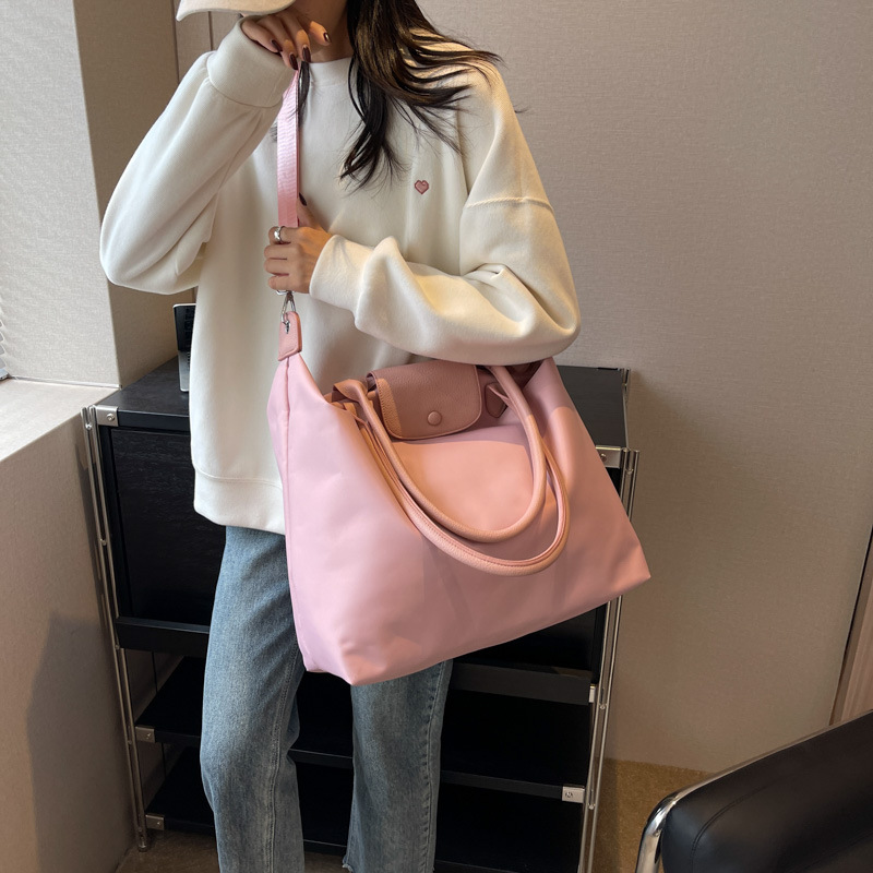 Bolsa de asas de gran capacidad de color sólido 2024 Nueva bolsa de viaje crossbody bolsa de equipaje de viaje de negocios de estilo coreano bolsa de almacenamiento simple