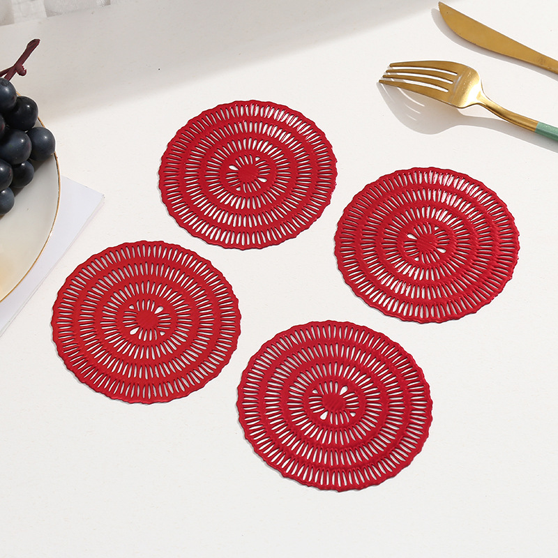 Transfronterizo China rojo hueco almohadilla de mesa de PVC almohadilla de comedor europea aislamiento de viento almohadilla de mesa impermeable a prueba de aceite