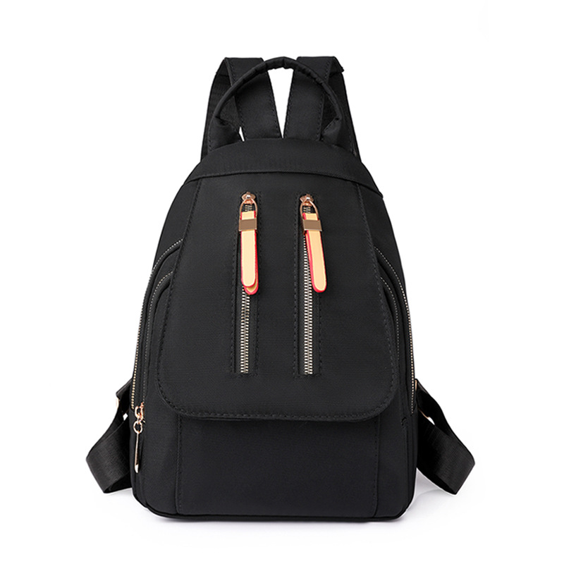 Comercio exterior al por mayor 2023 nueva mochila de nailon para mujer coreana simple mochila de viaje urbano pequeño bolso femenino