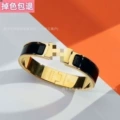 Gold black enamel bracelet