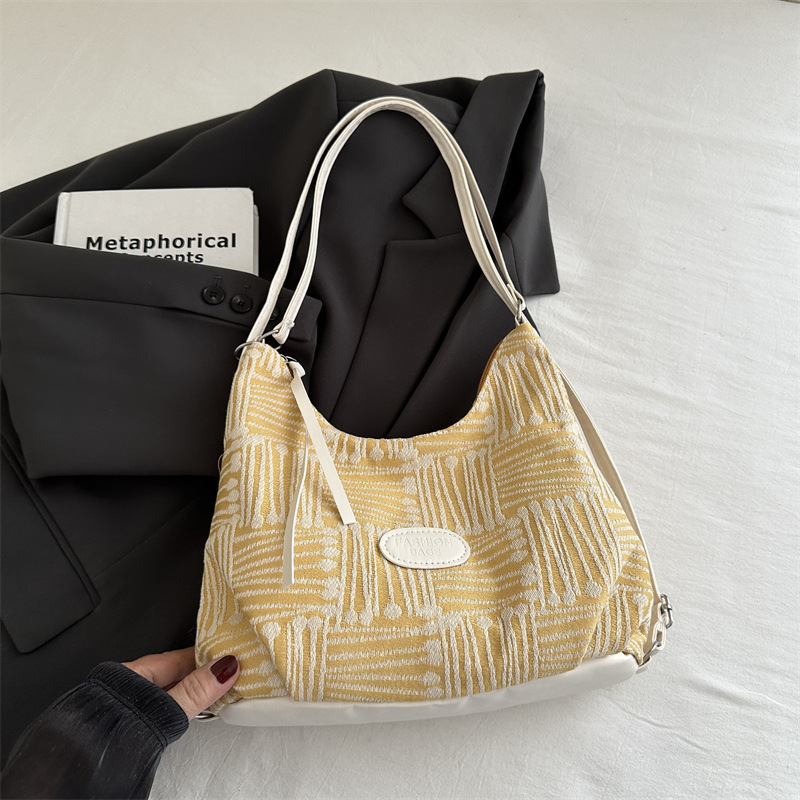 Bolso de lona para mujeres 2024 nuevo otoño bolso universitario de doble propósito mochila de hombro de viaje universal mochila de hombro