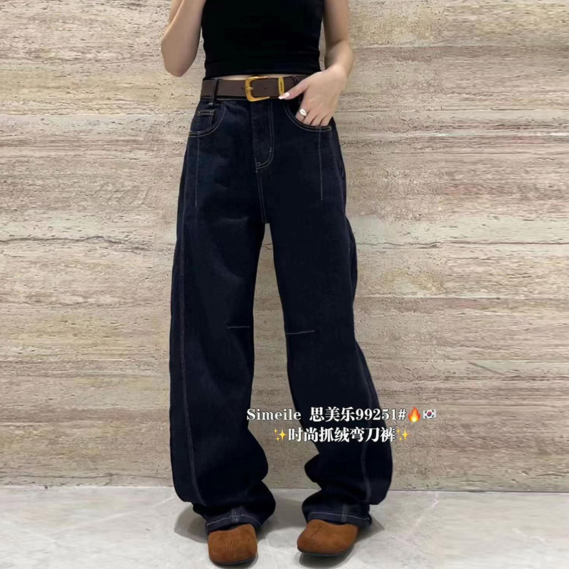 思美楽ファッションは毛の曲がった刀のズボンのデザイン感のジーパンの女性の秋冬の水洗いの百合のゆったりしている感じの広腿のズボンをつかみます。|undefined