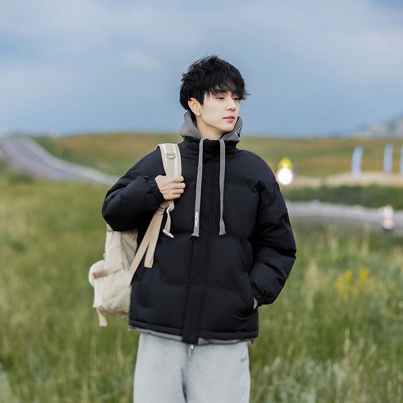 Abrigo acolchado de algodón para hombres invierno 2023 nuevo abrigo de pan con capucha de color sólido suelta pareja de moda falso Abrigo acolchado de algodón de dos piezas
