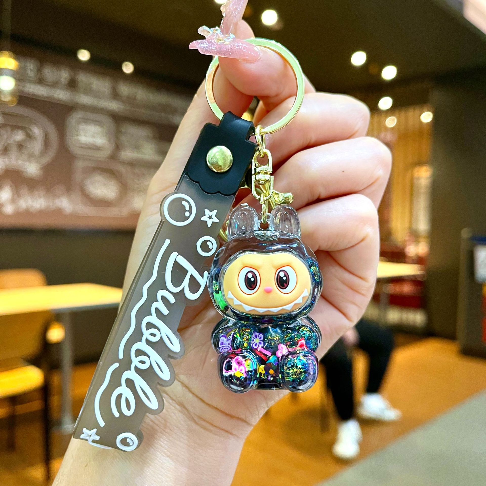 Llavero red acrílico con arena flotante