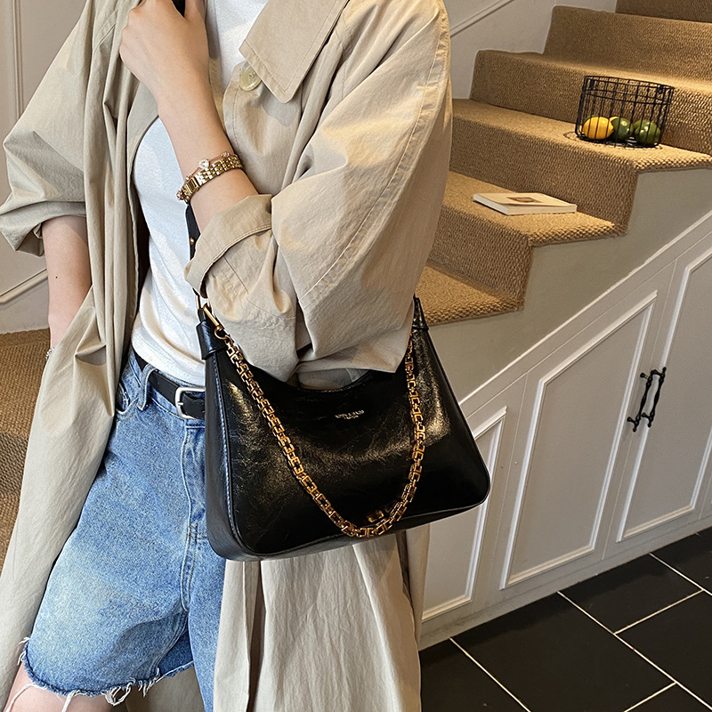 Bolsos de brazo de alta sensación de mujer 2025 nuevo nicho retro cera petot bolso cadena de hombro mochila