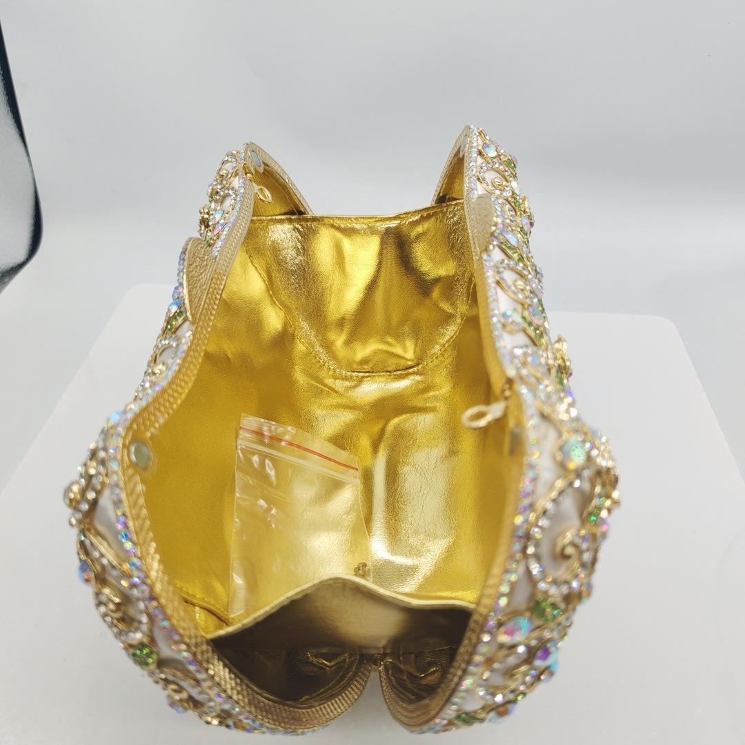 Nuevo paquete de cena de diamantes perforado transfronterizo caja metálica dura bolsa de diamantes bolsa de banquete europea y americana bolsa de mano bolsa de mujer bolsa