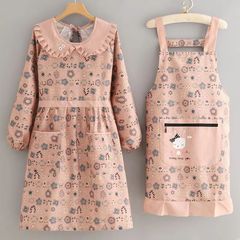 長袖の花の子供の襟のカバーの服の甘美で清新なキャンバスのエプロンは厚くて耐磨耗性があります。