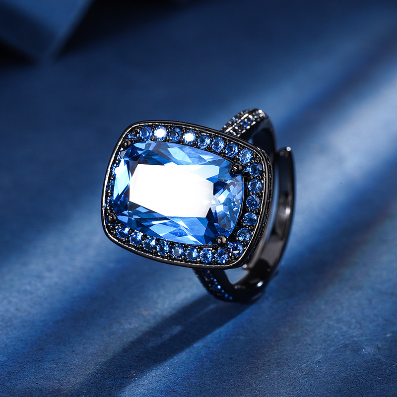 Zhuang Shengsheng Jewelry Fondo de cobre chapado en oro simulación corindón rojo cristal puntiagudo azul temperamento cuadrado gordo traje de oro negro mujer 10*14